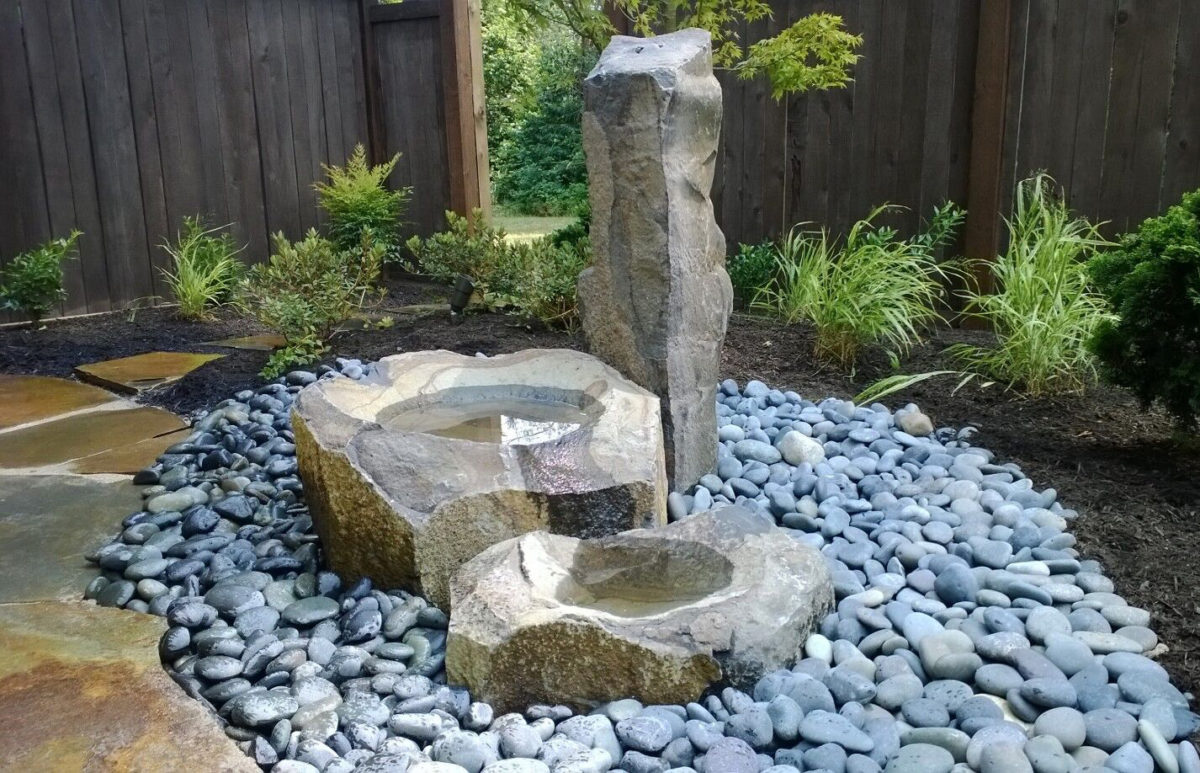 Water and stone can nourish your senses in a sanctuary. In Harmony Sustainable Landscapes