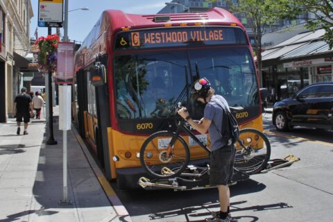 Help reduce climate change by walking, biking or taking the bus. SounderBruce, Flickr. In Harmony Sustainable Landscapes